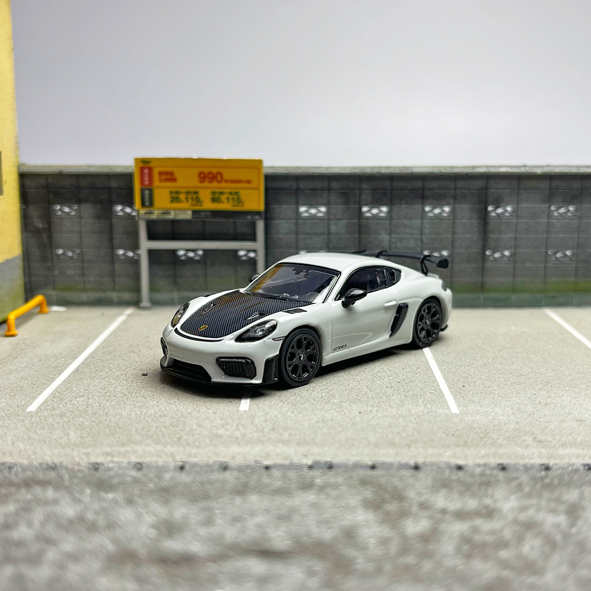 Tarmac Works Mini Cut TW co-branded 1:64 Porsche Cayman GT4 RS alloy car model.