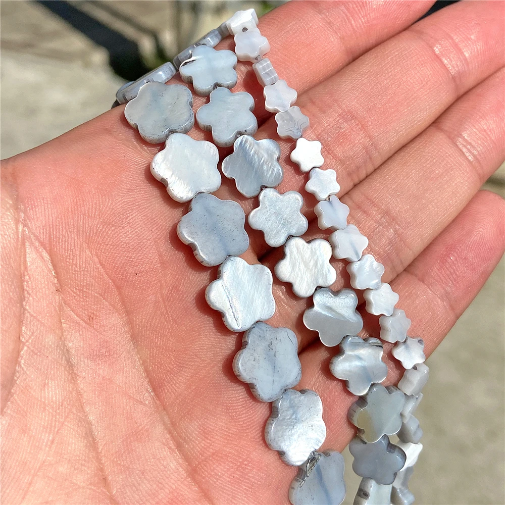 Cuentas en forma de flor de ciruela concha teñidas de color concha natural para hacer joyas - Imagen 19 de 25