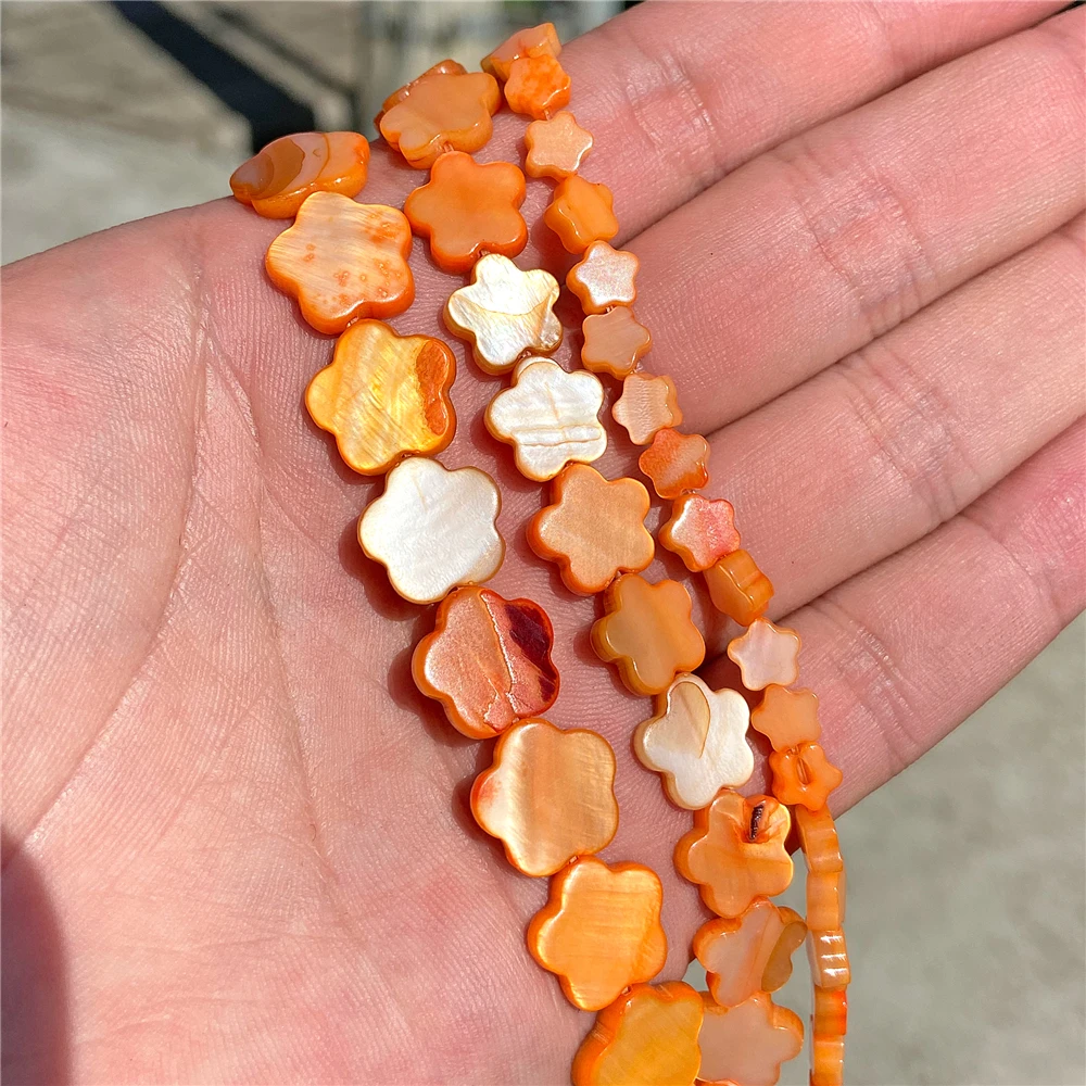 Cuentas en forma de flor de ciruela concha teñidas de color concha natural para hacer joyas - Imagen 22 de 25