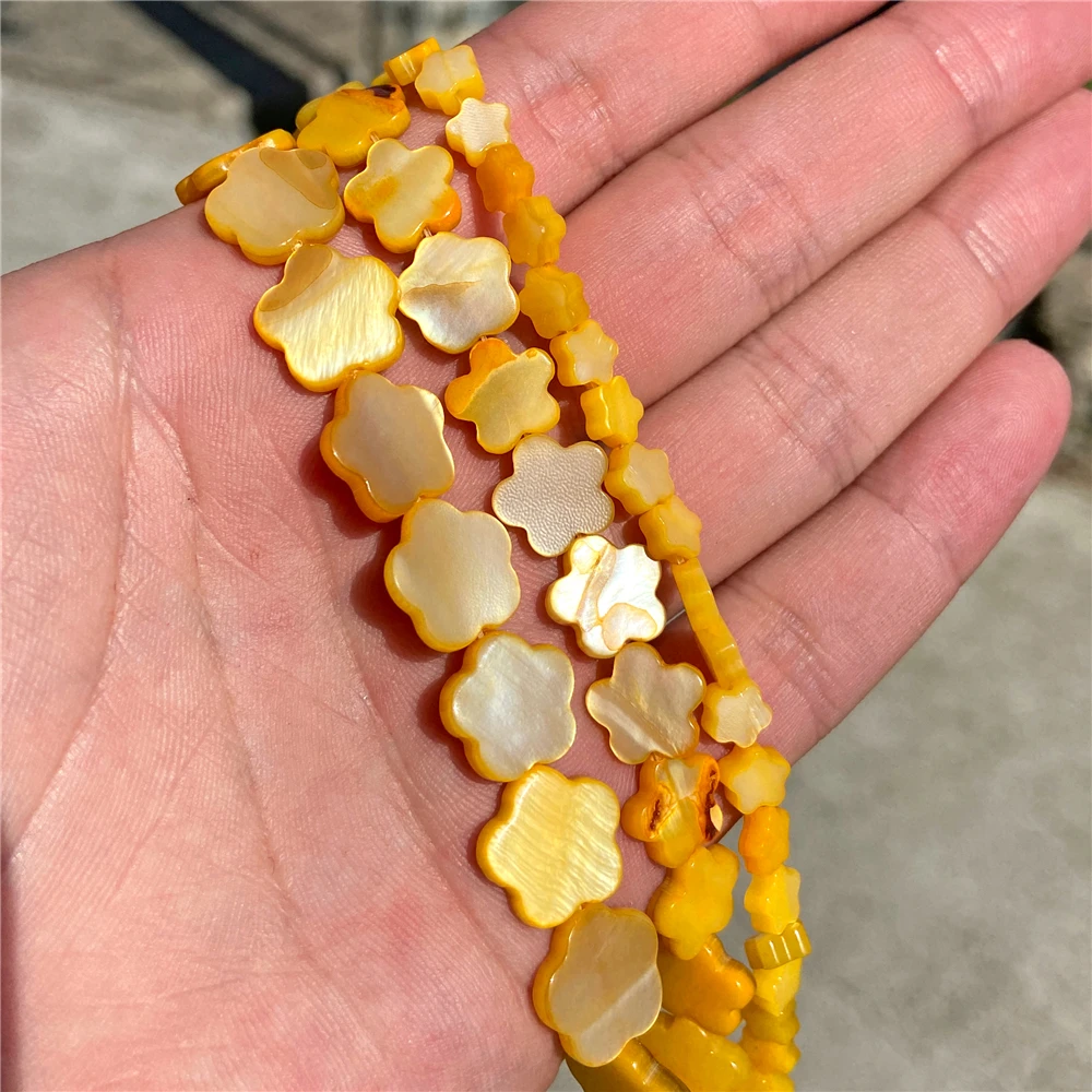 Cuentas en forma de flor de ciruela concha teñidas de color concha natural para hacer joyas - Imagen 23 de 25