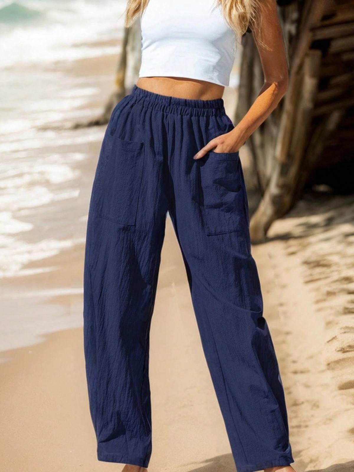 Pantalone donna vita alta relaxed fit con elastico in vita e tasca utility - Foto 16 di 18