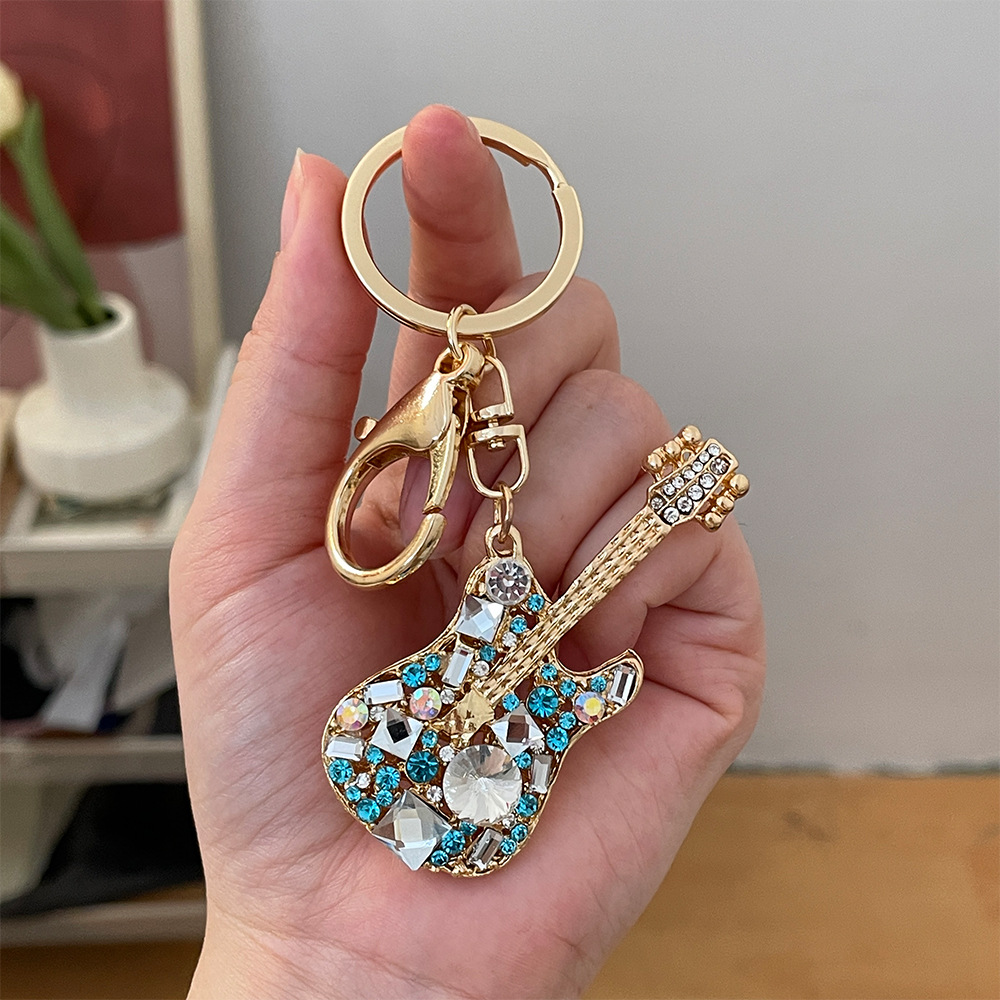 Crystal Guitar Keychain - Stylish Metal Instrument Car Bag Accessory - Picture 19 of 22